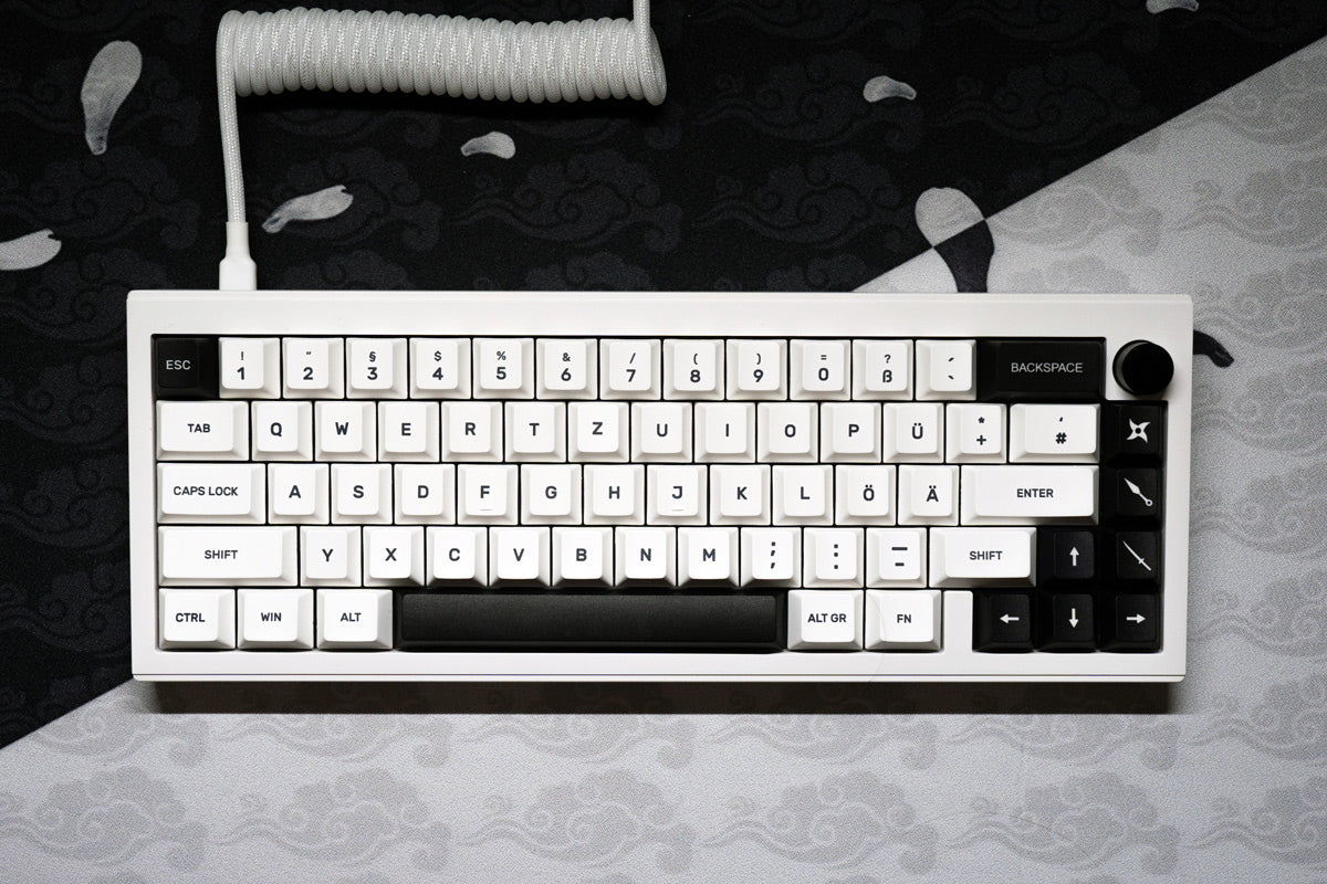 Ikigai keyboard top down view on ikigai mousepad with white coiled cable