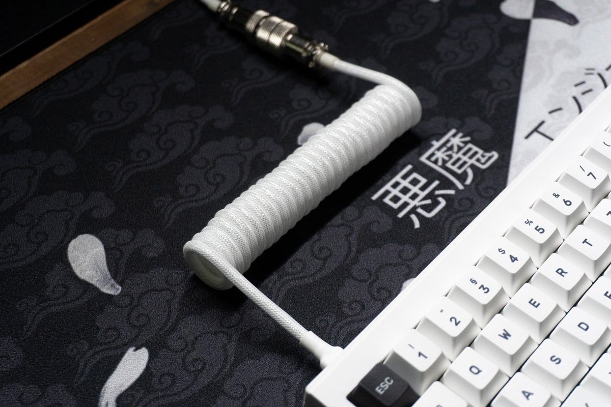 Lootcifer Coiled cable white side view connected to ikigai keyboard